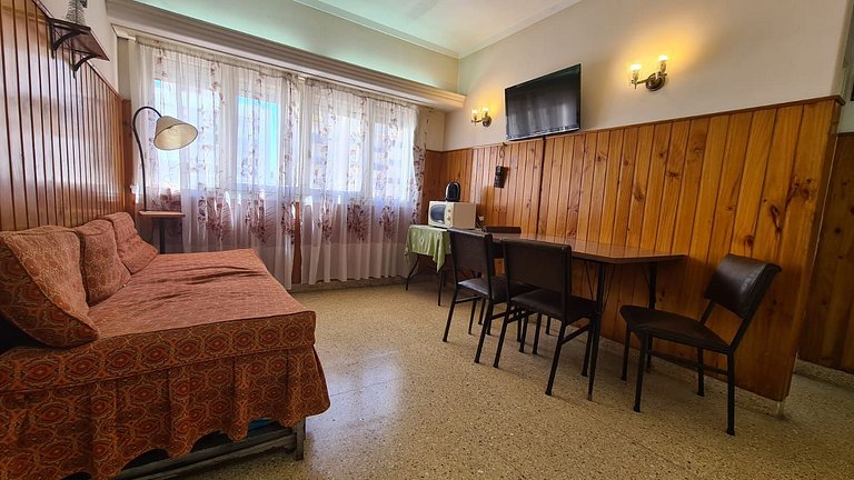 2 ambientes contra frente